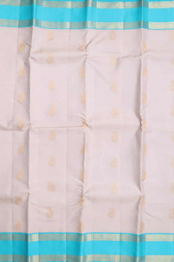 Kanchipuram Silk Saree In Cream With Paisley Buttas