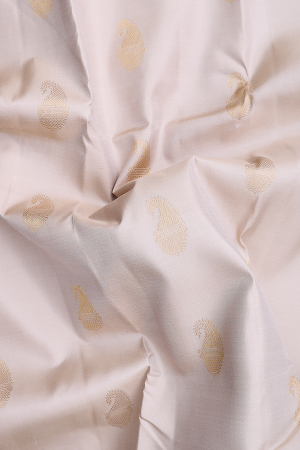 Kanchipuram Silk Saree In Cream With Paisley Buttas