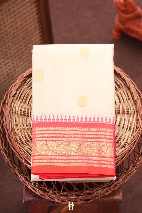 Kanchipuram Silk Saree In Beige With Peacock Buttas