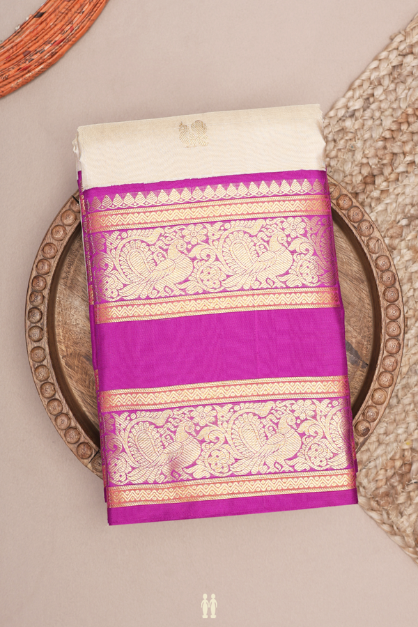Kanchipuram Silk Saree In Beige With Peacock Buttas