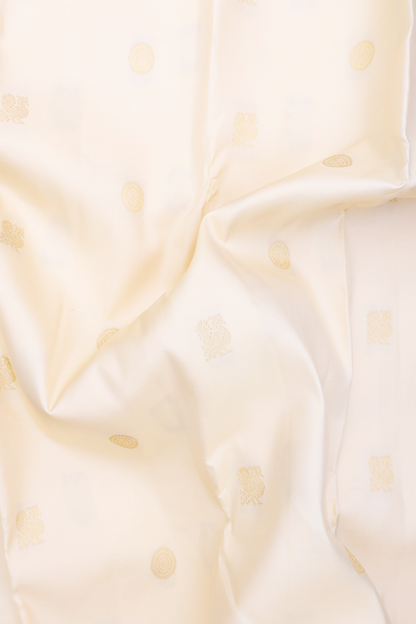 Kanchipuram Silk Saree In Beige With Peacock Buttas