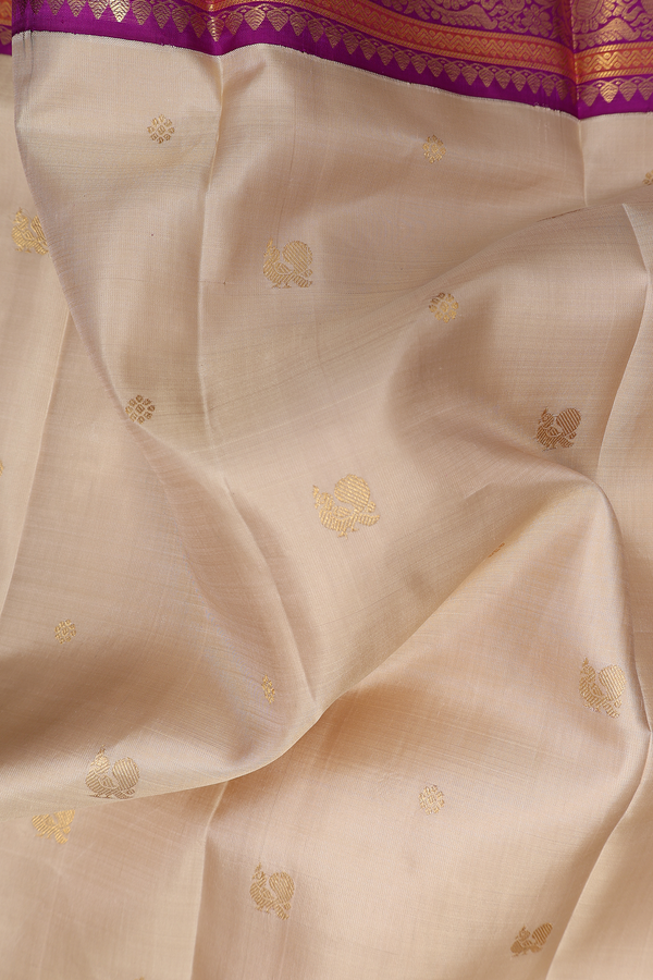Kanchipuram Silk Saree In Beige With Peacock Buttas