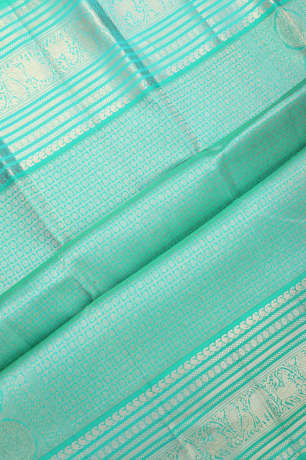 Kanchipuram Silk Saree In Beige With Thilagam Buttas