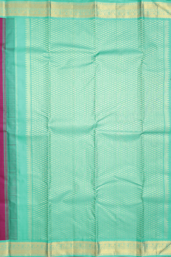 Kanchipuram Silk Saree In Berry Purple With Floral Buttas