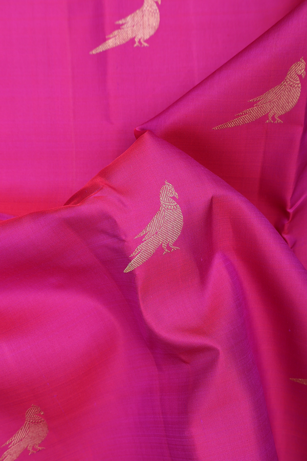 Kanchipuram Silk Saree In Plum Purple With Parrot Buttas