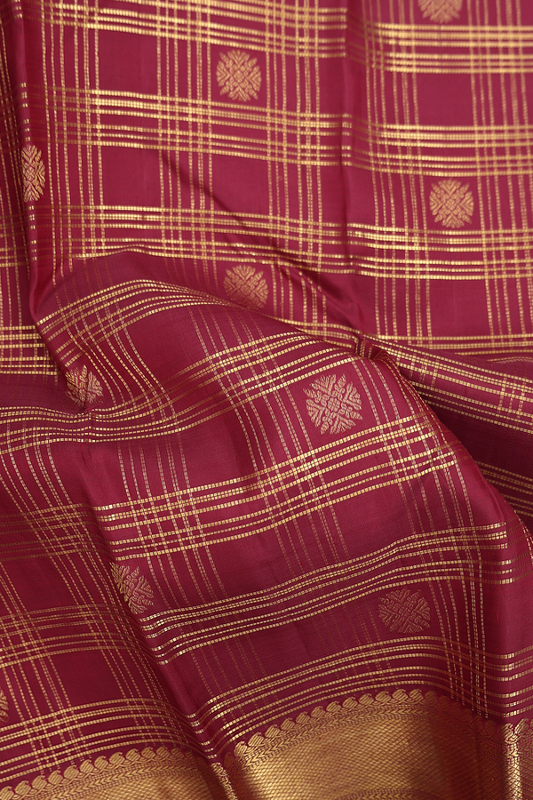Kanchipuram Silk Saree In Berry Red Along Checks With Buttas