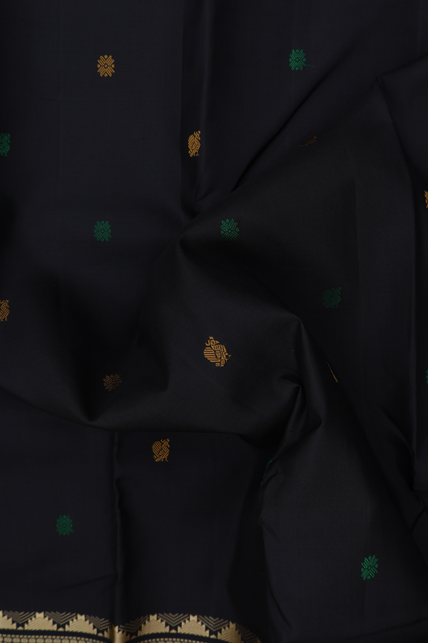 Kanchipuram Silk Saree In Black With Floral Peacock Buttas