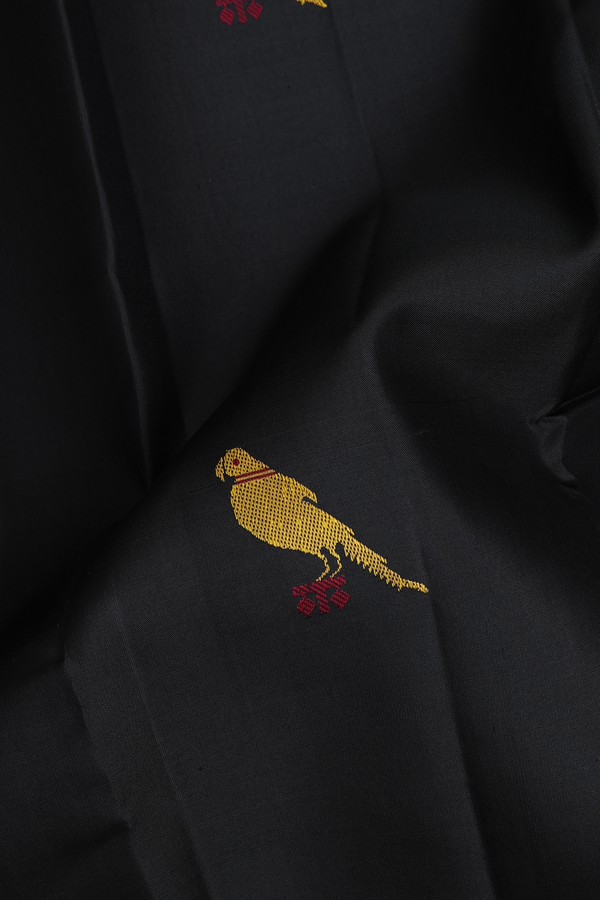 Kanchipuram Silk Saree In Black With Parrot Buttas