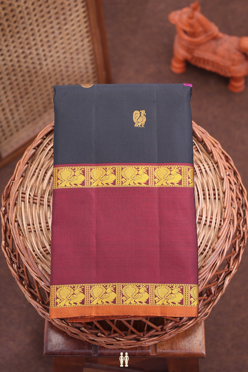 Kanchipuram Silk Saree In Black With Peacock Buttas