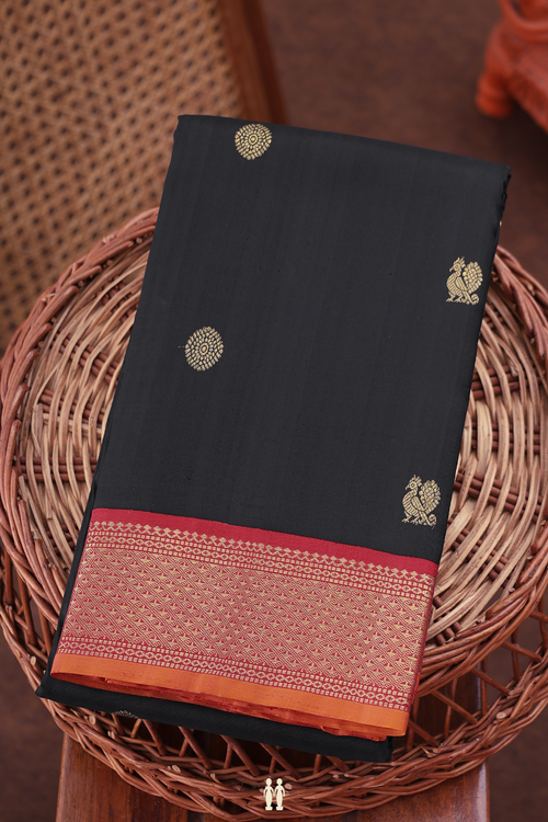 Kanchipuram Silk Saree In Black With Peacock Buttas