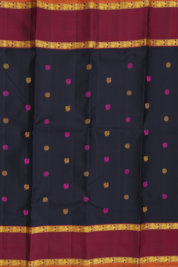 Kanchipuram Silk Saree In Black With Peacock Buttas