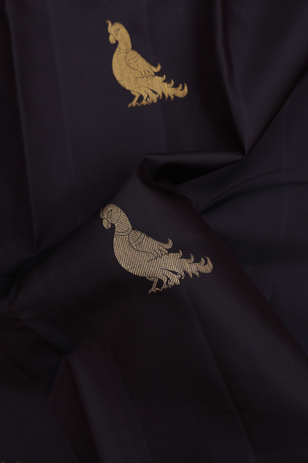 Kanchipuram Silk Saree In Black With Peacock Buttas