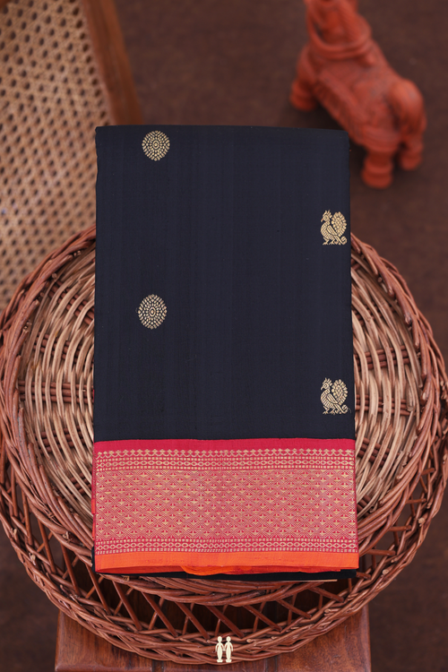 Kanchipuram Silk Saree In Black With Peacock Chakram Buttas
