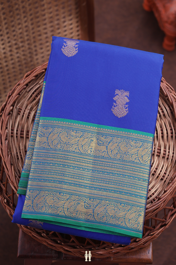 Kanchipuram Silk Saree In Blue With Iruthalai Pakshi Buttas