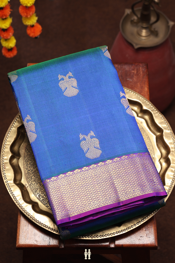 Kanchipuram Silk Saree In Blue With Iruthalai Pakshi Buttas