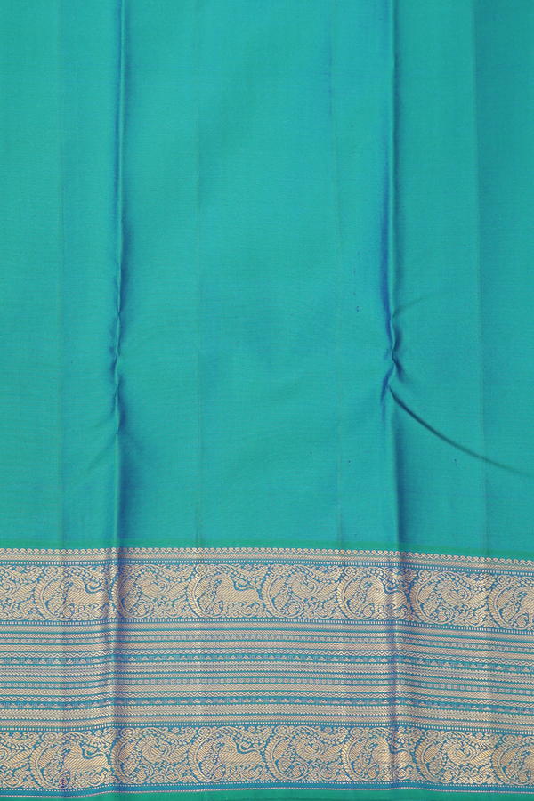 Kanchipuram Silk Saree In Blue With Iruthalai Pakshi Buttas