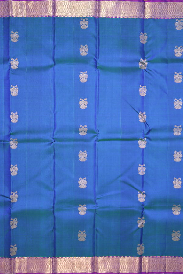 Kanchipuram Silk Saree In Blue With Iruthalai Pakshi Buttas