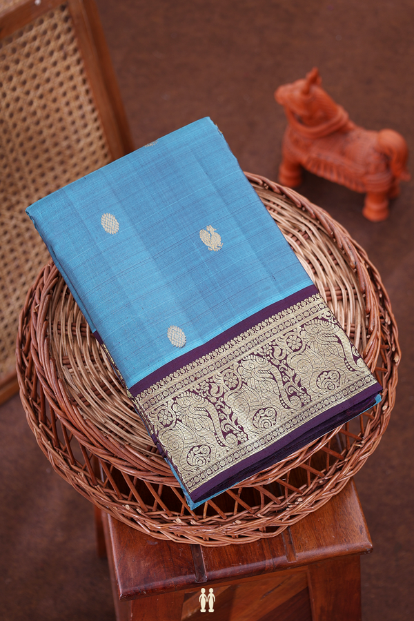 Kanchipuram Silk Saree In Blue With Peacock Buttas