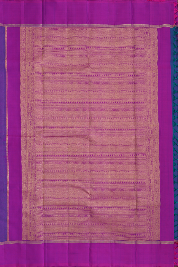 Kanchipuram Silk Saree In Blue With Peacock Buttas