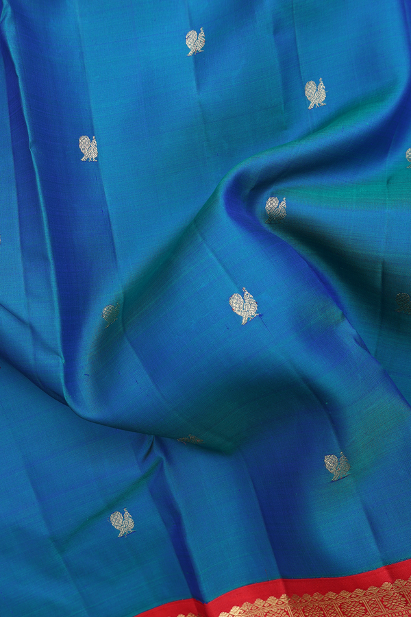 Kanchipuram Silk Saree In Blue With Peacock Buttas
