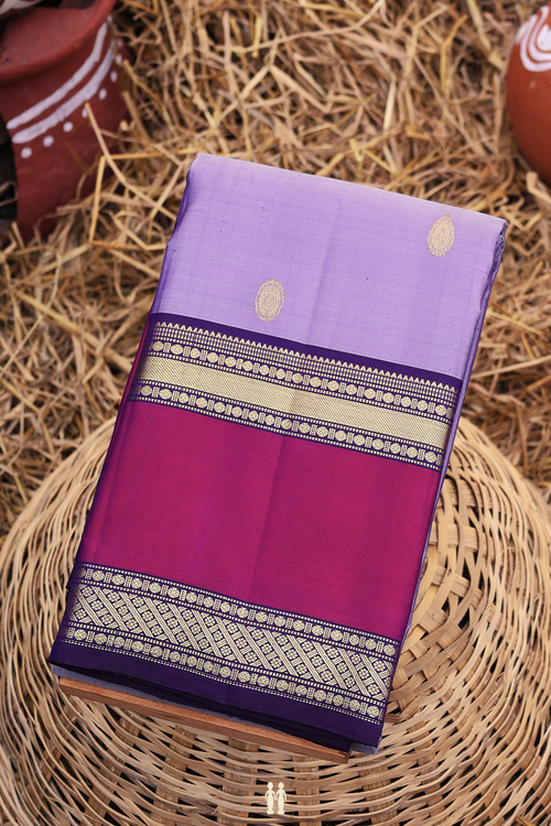 Kanchipuram Silk Saree In Bluish Purple With Chakram Buttas