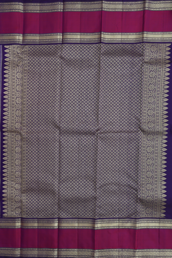 Kanchipuram Silk Saree In Bluish Purple With Chakram Buttas