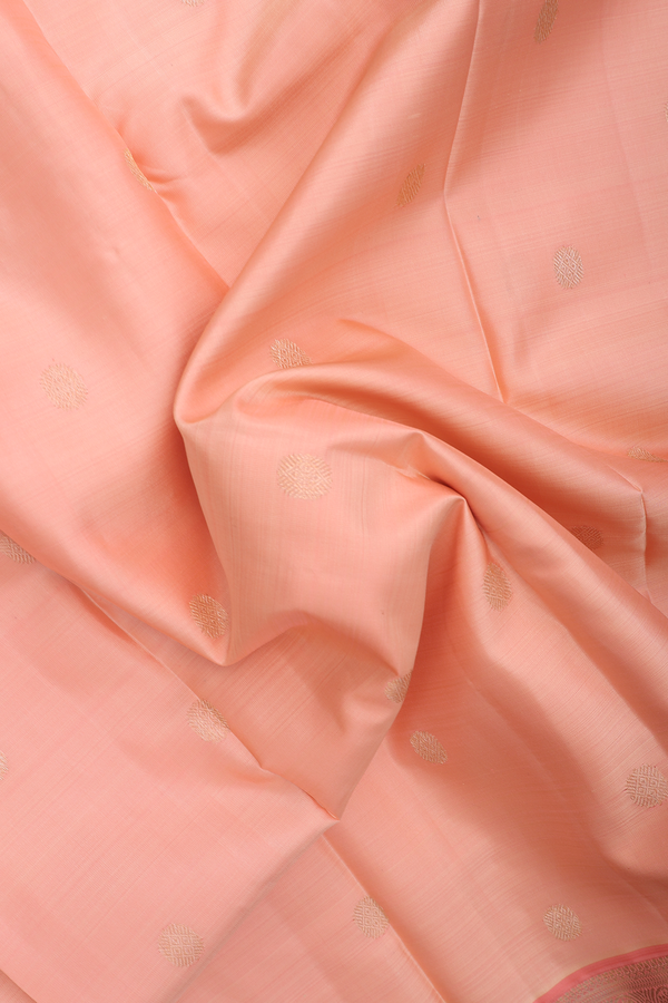 Kanchipuram Silk Saree In Blush Orange With Chakram Buttas