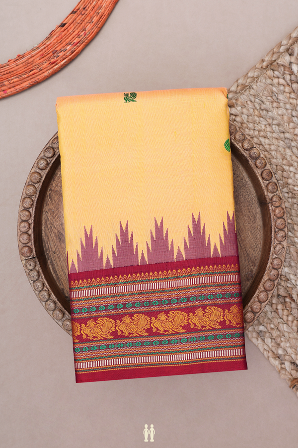 Kanchipuram Silk Saree In Blush Orange With Peacock Buttas