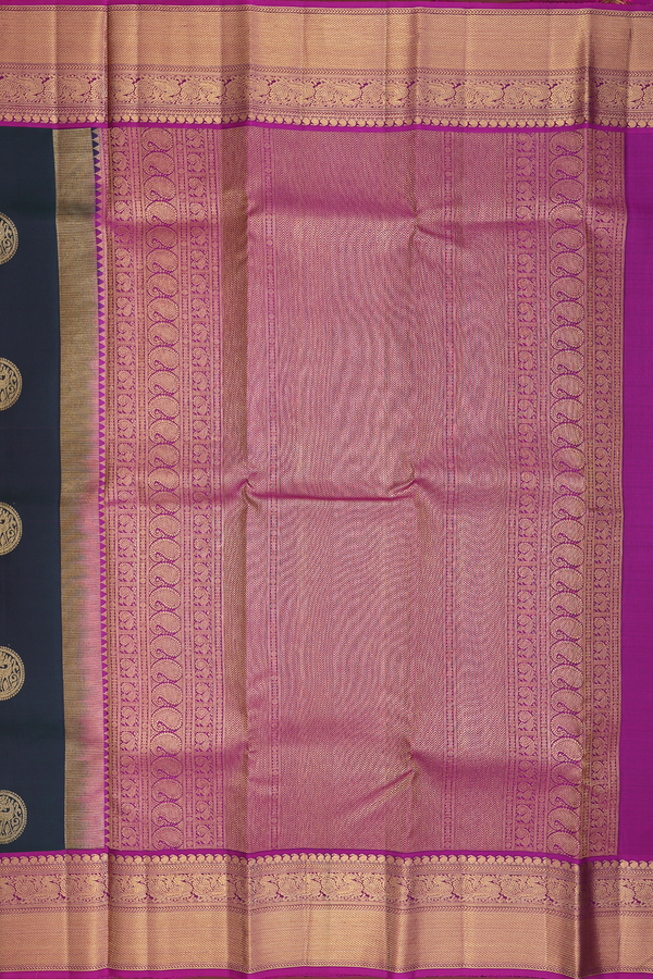 Kanchipuram Silk Saree In Bottle Green With Chakram Buttas