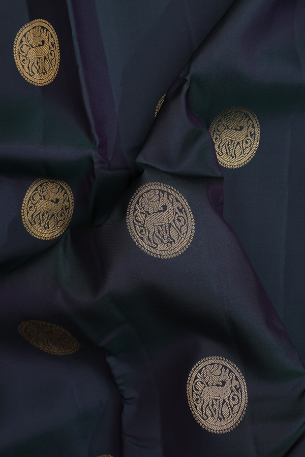Kanchipuram Silk Saree In Bottle Green With Chakram Buttas