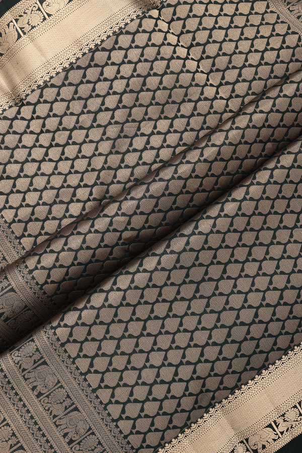 Kanchipuram Silk Saree In Bottle Green With Floral Buttas
