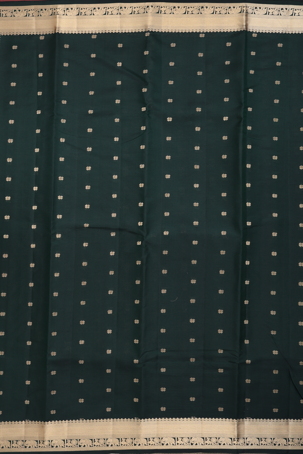 Kanchipuram Silk Saree In Bottle Green With Floral Buttas