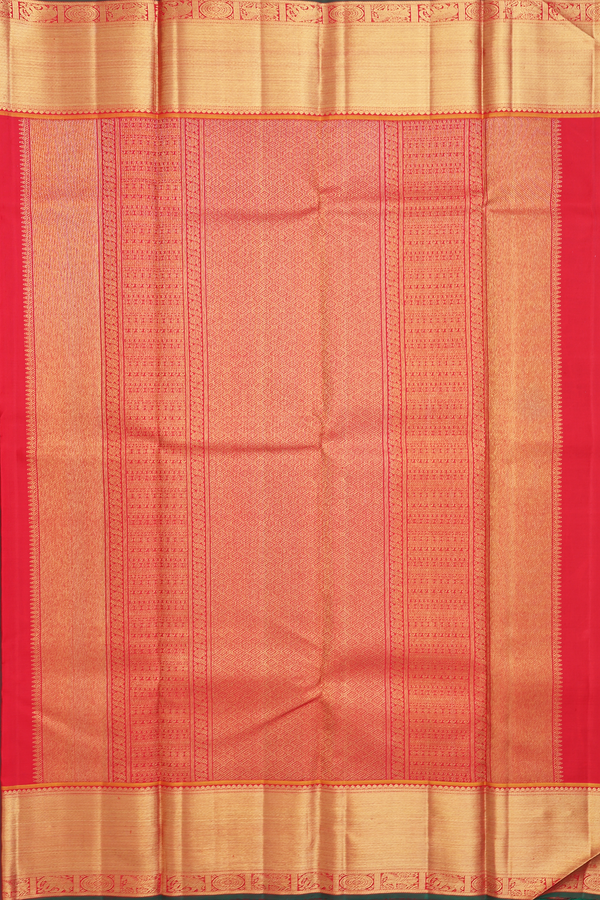 Kanchipuram Silk Saree In Bottle Green With Peacock Buttas