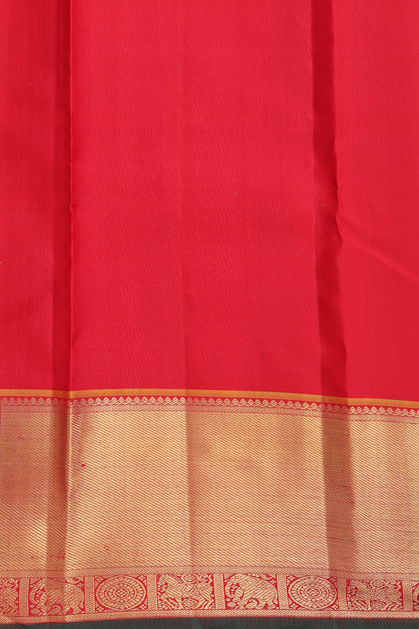 Kanchipuram Silk Saree In Bottle Green With Peacock Buttas