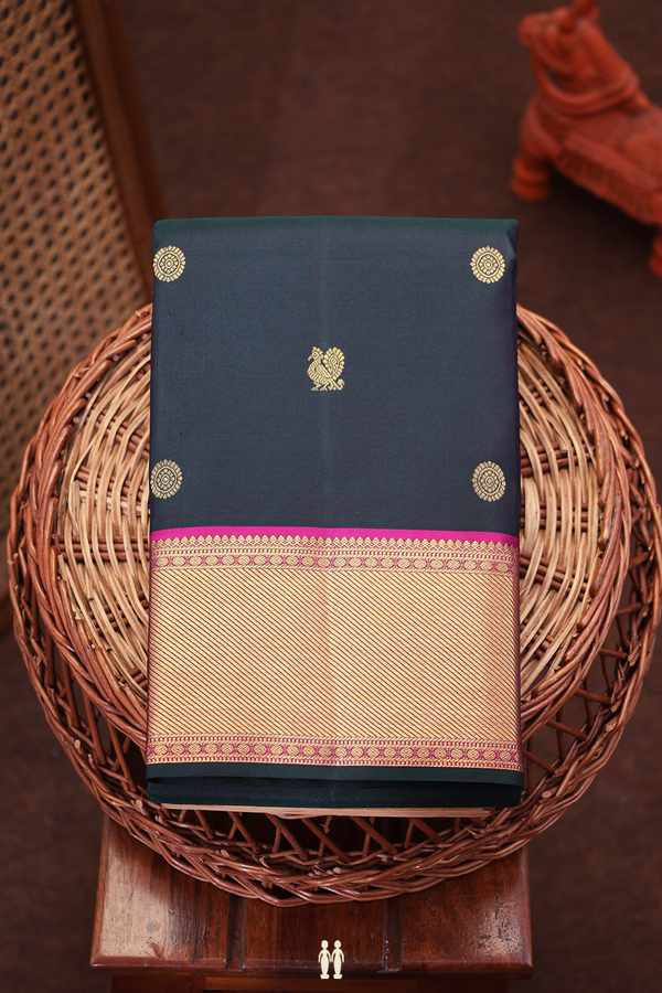 Kanchipuram Silk Saree In Bottle Green With Peacock Buttas