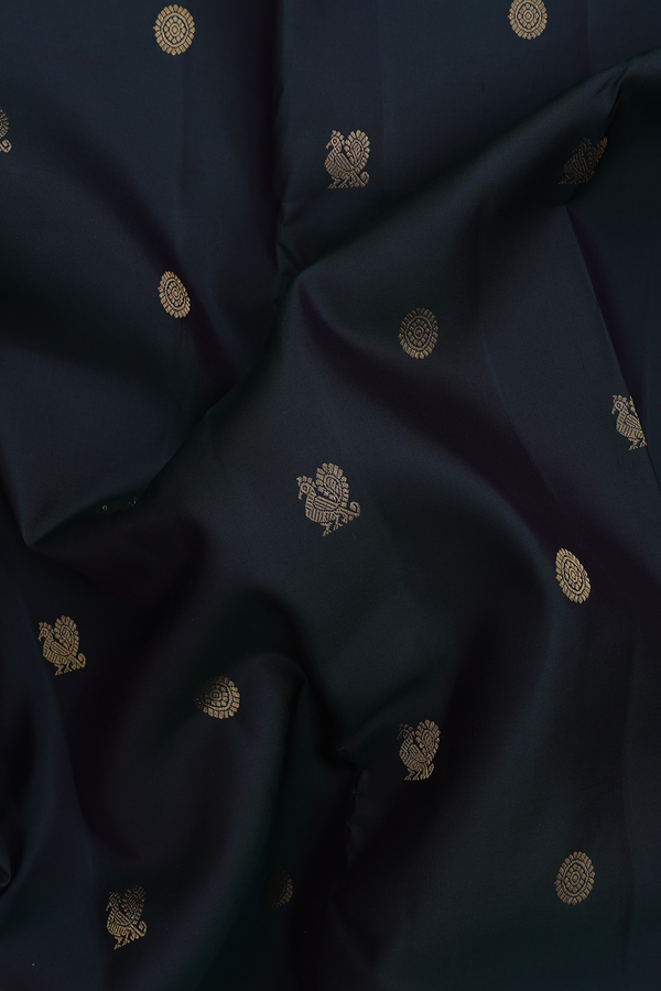 Kanchipuram Silk Saree In Bottle Green With Peacock Buttas