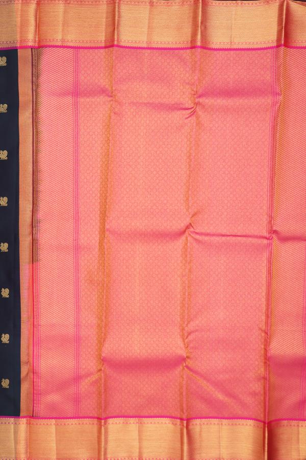 Kanchipuram Silk Saree In Bottle Green With Peacock Buttas
