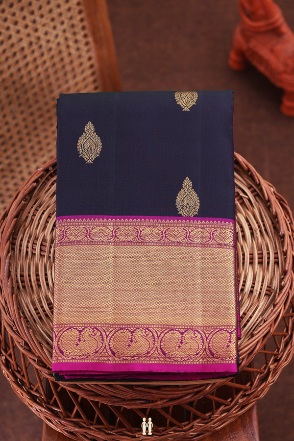 Kanchipuram Silk Saree In Bottle Green With Zari Buttas