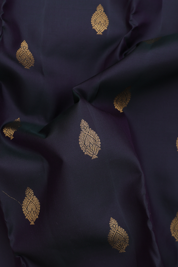 Kanchipuram Silk Saree In Bottle Green With Zari Buttas