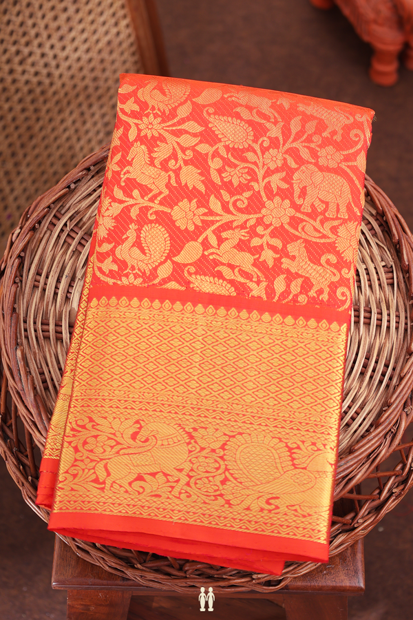 Kanchipuram Silk Saree In Bright Orange With Brocade Design