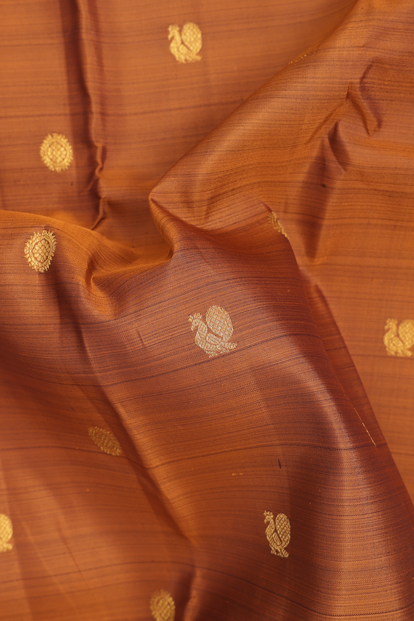 Kanchipuram Silk Saree In Brown With Peacock Buttas