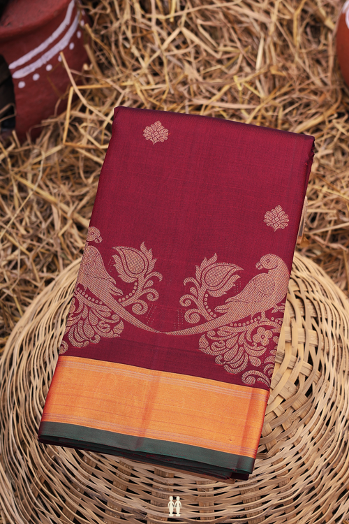 Kanchipuram Silk Saree In Burgundy Red With Floral Buttas