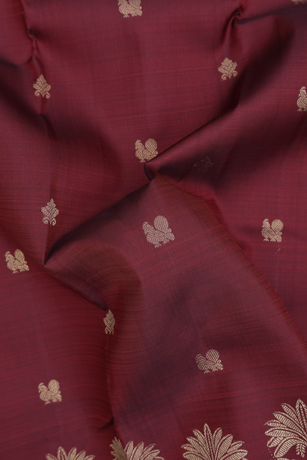 Kanchipuram Silk Saree In Burgundy Red With Peacock Buttas