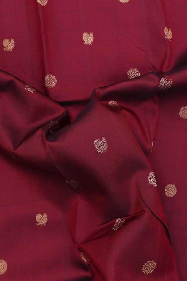 Kanchipuram Silk Saree In Burgundy Red With Peacock Buttas