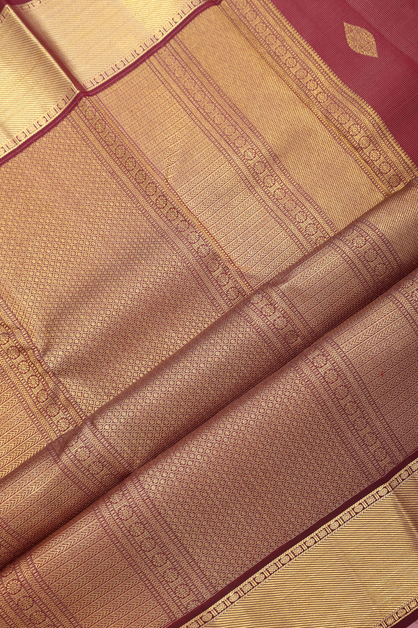 Kanchipuram Silk Saree In Burgundy Red With Zari Buttas