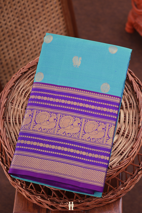 Kanchipuram Silk Saree In Cerulean Blue With Peacock Buttas