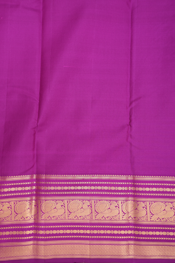 Kanchipuram Silk Saree In Cerulean Blue With Peacock Buttas