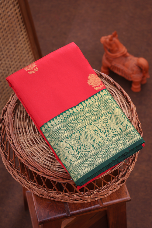 Kanchipuram Silk Saree In Chilli Red With Floral Buttas