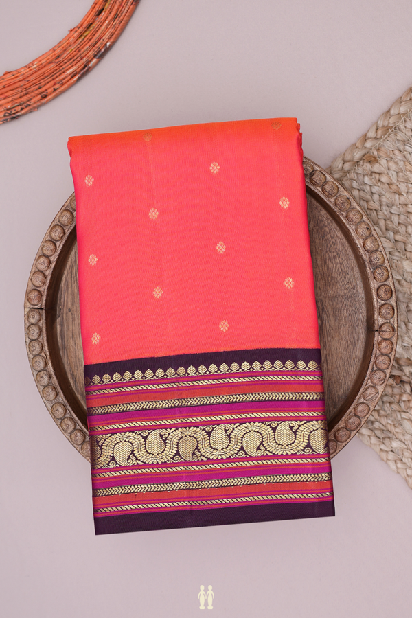 Kanchipuram Silk Saree In Coral Pink With Floral Buttis