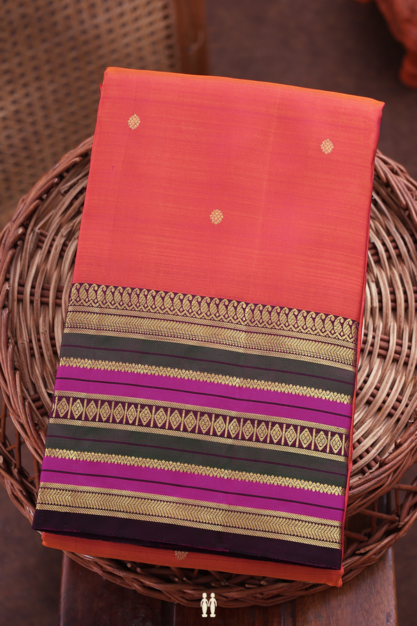 Kanchipuram Silk Saree In Coral Pink With Floral Buttis